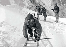 Crossing a crevasse in the Himalayas during the assault on Mt Everest by Sir Edmund Hillary and Tenzing Norgay in 1953. Photographer Alfred Gregory. (Source: Alfred Gregory: Photographs from Everest to Africa. Penguin Books, 2008, ISBN 978-1-920-98961-3) Crossing a crevasse in the Himalayas during the assault on Mt Everest by Sir Edmund Hillary and Tenzing Norgay in 1953. Photographer Alfred Gregory. (Source: Alfred Gregory: Photographs from Everest to Africa. Penguin Books, 2008, ISBN 978-1-920-98961-3)