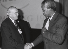 Nelson Mandela shakes hands with his predecessor Frederik de Klerk and at Davos, January 1992 (Source: Wikimedia Commons) Nelson Mandela shakes hands with his predecessor Frederik de Klerk and at Davos, January 1992 (Source: Wikimedia Commons)