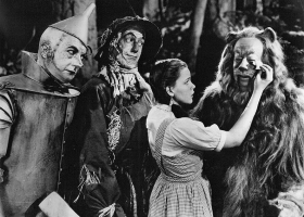 The Wizard of Oz – a publicity still of Jack Haley, Ray Bolger, Judy Garland and Bert Lahr promoting the 1966 CBS broadcast of the 1939 MGM feature film (Source: Wikimedia Commons) The Wizard of Oz – a publicity still of Jack Haley, Ray Bolger, Judy Garland and Bert Lahr promoting the 1966 CBS broadcast of the 1939 MGM feature film (Source: Wikimedia Commons)