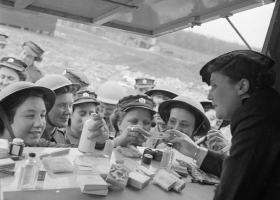 YWCA Mobile Club shop visiting an anti-aircraft site somewhere in Britain, 1943 (Source: Wikimedia Commons) YWCA Mobile Club shop visiting an anti-aircraft site somewhere in Britain, 1943 (Source: Wikimedia Commons)