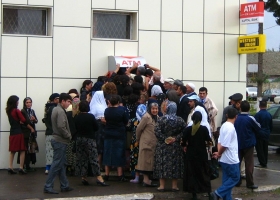 The big queue at an ATM in Masalli, Azerbaijan, 2008 (Source: Wikimedia Commons) The big queue at an ATM in Masalli, Azerbaijan, 2008 (Source: Wikimedia Commons)