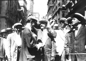 Stock trading on the New York Curb Association market, with brokers and clients signaling from street to offices, 1916 (Source: Wikimedia Commons) Stock trading on the New York Curb Association market, with brokers and clients signaling from street to offices, 1916 (Source: Wikimedia Commons)