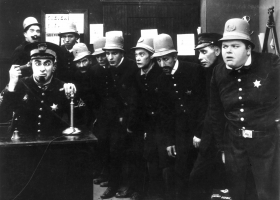 The Keystone Cops, 'In the Clutches of the Gang, 1914, directed by George Nichols and Mack Sennett (Source: Wikimedia Commons) The Keystone Cops, 'In the Clutches of the Gang, 1914, directed by George Nichols and Mack Sennett (Source: Wikimedia Commons)