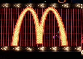 The McDonalds sign in Times Square (Source: Wikimedia Commons) The McDonalds sign in Times Square (Source: Wikimedia Commons)