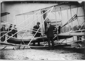 Orville and Wilbur Wright examine canoe fittings before the first flight over water, 1909 (Courtesy: Library of Congress) Orville and Wilbur Wright examine canoe fittings before the first flight over water, 1909 (Courtesy: Library of Congress)