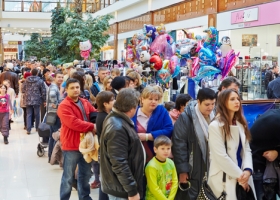 People with children stand in queue to oceanarium at shopping mall RIO at Moscow Dmitrovsky highway People with children stand in queue to oceanarium at shopping mall RIO at Moscow Dmitrovsky highway