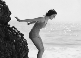 Women jumping in the water Women jumping in the water