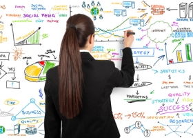 Business woman draws modern business concept Business woman draws modern business concept